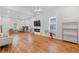 Spacious open-concept living room with hardwood floors, vaulted ceilings, and ample natural light at 1598 Jonesboro Se Rd, Atlanta, GA 30315
