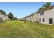 A spacious backyard with a large grassy area at 1785 Fielding Way, Hampton, GA 30228