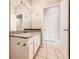 Bathroom featuring granite countertop and white cabinets at 1785 Fielding Way, Hampton, GA 30228