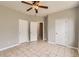 Bedroom featuring tile floor and painted in a neutral color at 1785 Fielding Way, Hampton, GA 30228