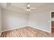 Bedroom features beautiful wood floors and painted in a neutral color at 1785 Fielding Way, Hampton, GA 30228