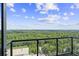 Enjoy breathtaking treetop views and cityscapes from this condo's private balcony at 3630 Peachtree Rd # 1909, Atlanta, GA 30326
