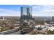 Modern high-rise condominium building with reflective glass windows, offering urban living in a luxurious setting with stunning city views at 3630 Peachtree Rd # 1909, Atlanta, GA 30326
