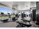 Well-equipped fitness center with modern equipment, mirrors, and panoramic city views for an invigorating workout at 3630 Peachtree Rd # 1909, Atlanta, GA 30326