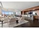 Stylish living room with floor-to-ceiling windows, contemporary furnishings, and a refined bar area at 3630 Peachtree Rd # 1909, Atlanta, GA 30326