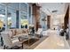 Elegant lobby with comfortable seating, high ceilings, and large windows offering abundant natural light at 3630 Peachtree Rd # 1909, Atlanta, GA 30326
