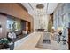 Beautifully decorated lobby featuring stylish seating, a modern chandelier, and sophisticated decor at 3630 Peachtree Rd # 1909, Atlanta, GA 30326