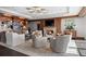 Elegant lounge area with a cozy fireplace, custom shelving, and comfortable seating for relaxation at 3630 Peachtree Rd # 1909, Atlanta, GA 30326
