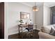 Comfortable home office space with industrial desk and stylish lighting at 3630 Peachtree Rd # 1909, Atlanta, GA 30326