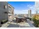 Enjoy outdoor living on this terrace with a fireplace, TV, and ample seating for entertaining at 3630 Peachtree Rd # 1909, Atlanta, GA 30326