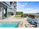 Rooftop pool with lounge area, a spa, and turf at 3630 Peachtree Rd # 1909, Atlanta, GA 30326