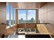 Modern stairwell with a city view, featuring sleek design and ample natural light through expansive windows at 3630 Peachtree Rd # 1909, Atlanta, GA 30326