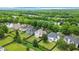 An aerial view of a neighborhood with fenced-in backyards and well-maintained lawns, providing privacy and space at 7325 Thoreau Cir, Atlanta, GA 30349