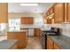 Bright kitchen featuring modern appliances and countertops at 7325 Thoreau Cir, Atlanta, GA 30349