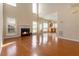 Bright living room with a fireplace and hardwood floors at 7325 Thoreau Cir, Atlanta, GA 30349