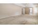 Spacious main bedroom with ceiling fan and ensuite bathroom at 7325 Thoreau Cir, Atlanta, GA 30349