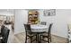 Cozy dining nook features shiplap accents, vintage hutch, and charming view to the Gathering room at 1424 Brighton, Loganville, GA 30052