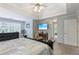 Main bedroom with a desk, television, and plenty of natural light at 1424 Brighton, Loganville, GA 30052