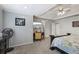 Large main bedroom with tray ceiling, a desk area, and cozy carpeting at 1424 Brighton, Loganville, GA 30052