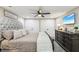 Spacious main bedroom featuring a large bed, dresser, and TV at 1424 Brighton, Loganville, GA 30052