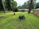 Spacious backyard featuring a privacy fence and mature trees, perfect for outdoor enjoyment at 1909 Cindy Dr, Decatur, GA 30032