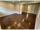 Bedroom featuring hardwood floors and adjoining bathroom at 1909 Cindy Dr, Decatur, GA 30032