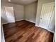 Bedroom featuring wood floors and closet at 1909 Cindy Dr, Decatur, GA 30032