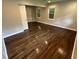 Bedroom featuring hardwood floors with many windows at 1909 Cindy Dr, Decatur, GA 30032