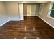 Bedroom featuring hardwood floors with view of bathroom at 1909 Cindy Dr, Decatur, GA 30032