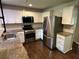 Modern kitchen featuring stainless steel appliances and granite countertops at 1909 Cindy Dr, Decatur, GA 30032