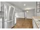 Open floor plan featuring an eat in kitchen with stainless appliances and an open view to living area at 1909 Cindy Dr, Decatur, GA 30032