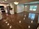 Open concept kitchen and living area with newly refinished floors at 1909 Cindy Dr, Decatur, GA 30032