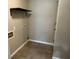 Mud room featuring tile flooring, floating shelf, and washer and dryer hookups at 1909 Cindy Dr, Decatur, GA 30032