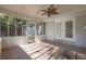 Charming sunroom with brick floors, ceiling fan and lots of natural light at 1909 Cindy Dr, Decatur, GA 30032