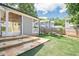 Lovely backyard with patio and stone steps leading to the fenced lawn at 2055 Summer View Place Sw, Marietta, GA 30060