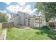 Spacious backyard with a well-kept lawn, patio, and attractive landscaping at 2055 Summer View Place Sw, Marietta, GA 30060