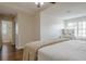 Spacious bedroom featuring wood-look flooring, a window, and ensuite bathroom at 2055 Summer View Place Sw, Marietta, GA 30060