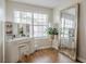 Bedroom with vanity, makeup mirror and natural light from the large window at 2055 Summer View Place Sw, Marietta, GA 30060