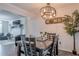 A cozy dining room with a dark wood table adjacent to the living room at 2055 Summer View Place Sw, Marietta, GA 30060
