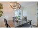 Cozy dining room with dark wood table and a view of the outdoor patio at 2055 Summer View Place Sw, Marietta, GA 30060