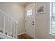 Entryway and staircase with natural light at 2055 Summer View Place Sw, Marietta, GA 30060
