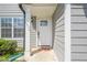 Close-up of front door, sidelight, and house numbers at 2055 Summer View Place Sw, Marietta, GA 30060