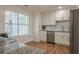 Bright kitchen with stainless steel appliances, granite countertops, and view from the window at 2055 Summer View Place Sw, Marietta, GA 30060
