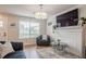 Inviting living room with a fireplace and an open floor plan at 2055 Summer View Place Sw, Marietta, GA 30060