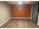 Bedroom featuring wood floors, neutral paint, curtains and a ceiling fan with light at 851 Walkingstick Dr, Douglasville, GA 30134