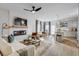 Open-concept living space with living room, dining area, and kitchen with stainless steel appliances at 231 Ivey Ter, Temple, GA 30179