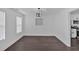 The dining room has white trim and plenty of natural light at 2586 Abbotts Glen Nw Dr, Acworth, GA 30101