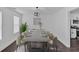This dining room features a table with seating for eight and modern decor at 2586 Abbotts Glen Nw Dr, Acworth, GA 30101