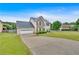 Attractive two-story residence showcasing a combination of brick and siding, a spacious driveway, and an attached two-car garage at 2586 Abbotts Glen Nw Dr, Acworth, GA 30101