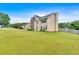 Well-maintained two-story home featuring brick accents, a large front yard, and a side-entry garage at 2586 Abbotts Glen Nw Dr, Acworth, GA 30101